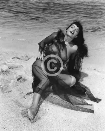 Bettie Page on the beach c. 1950s