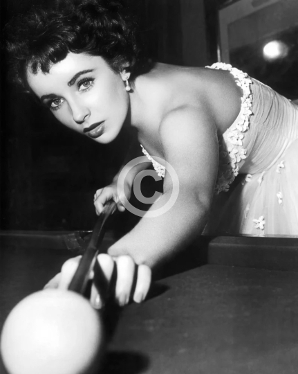 Elizabeth Taylor c. 1950s shooting pool